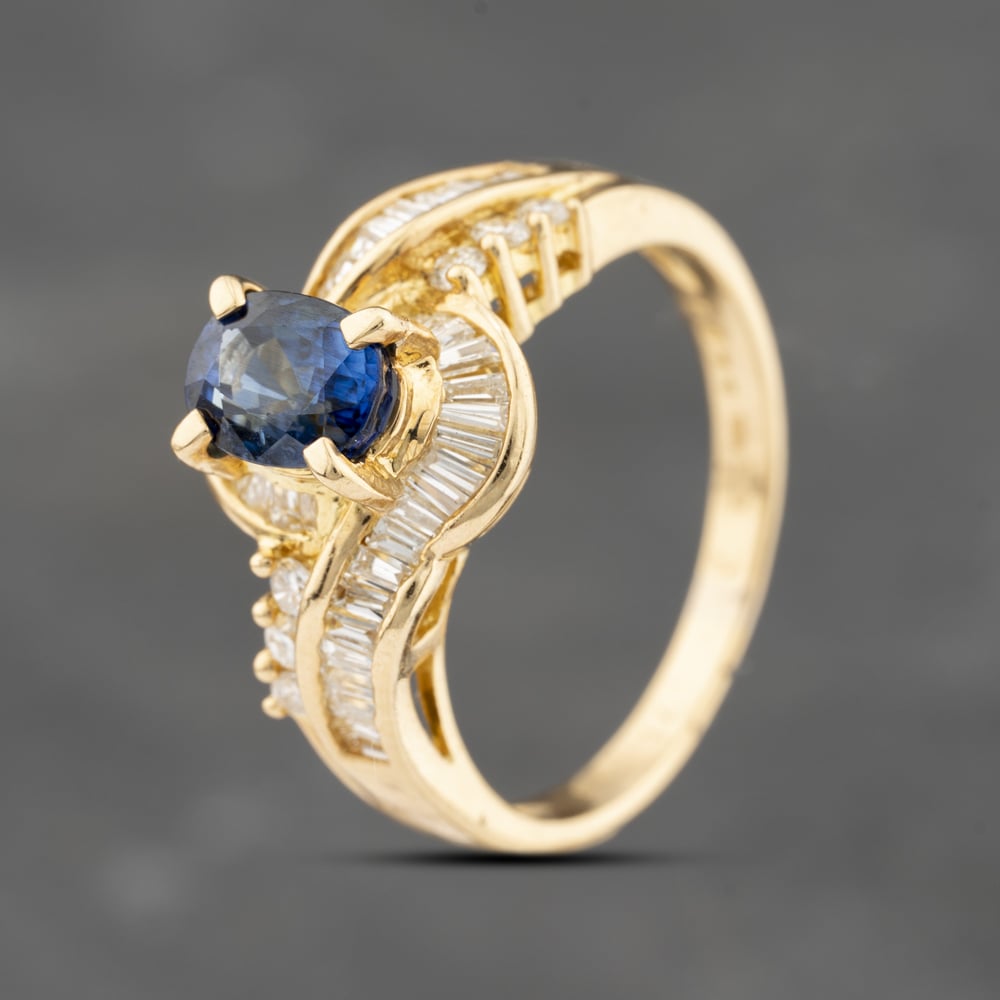 Click to view product details and reviews for Pre Owned 18ct Yellow Gold 143ct Sapphire And 073ct Diamond Oval Cluster Ring 43361194.