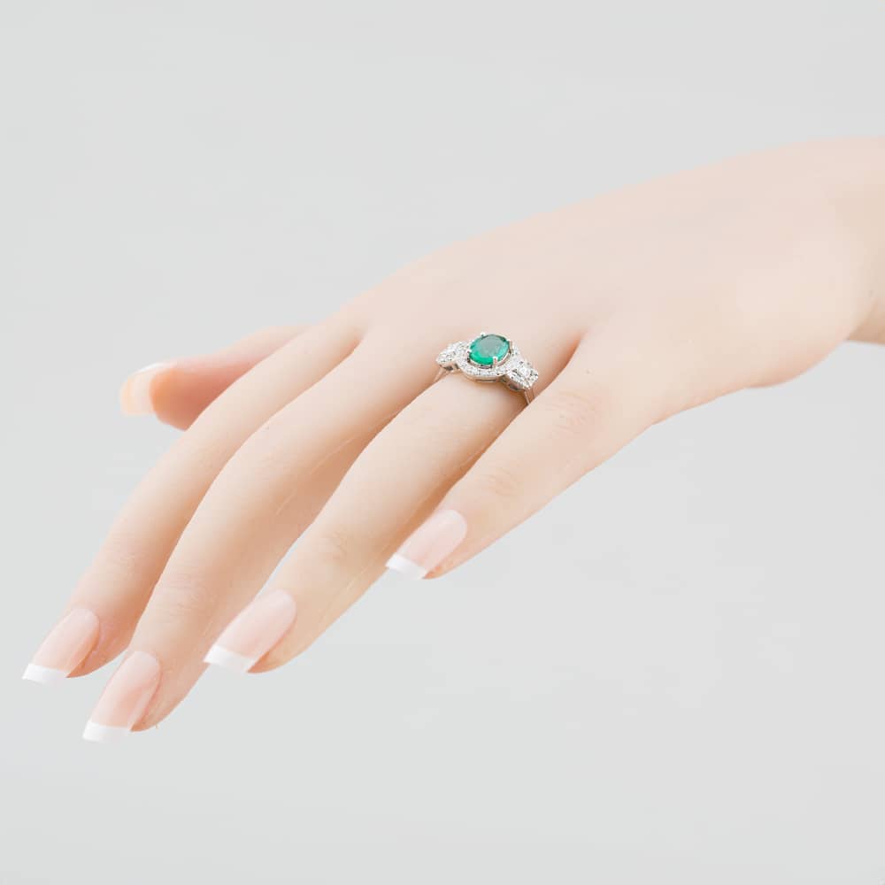 Pre-Owned 18ct White Gold Oval Cut Emerald & Diamond Cluster Ring 43371037