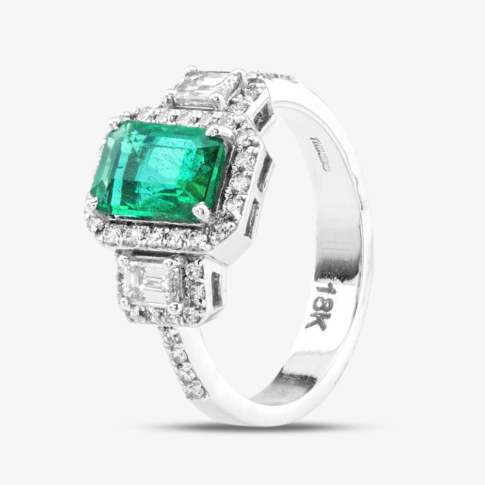 Product photograph of Pre-owned 18ct White Gold Oblong Cut Emerald Amp Diamond Cluster Ring 43371039 from The Jewel Hut