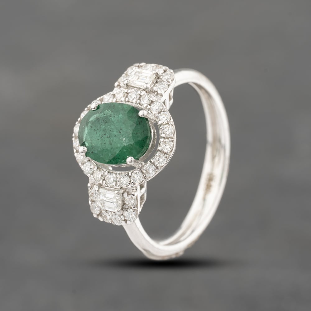 Click to view product details and reviews for Pre Owned 18ct White Gold Emerald And 058ct Diamond Oval Cluster Ring 43371060.