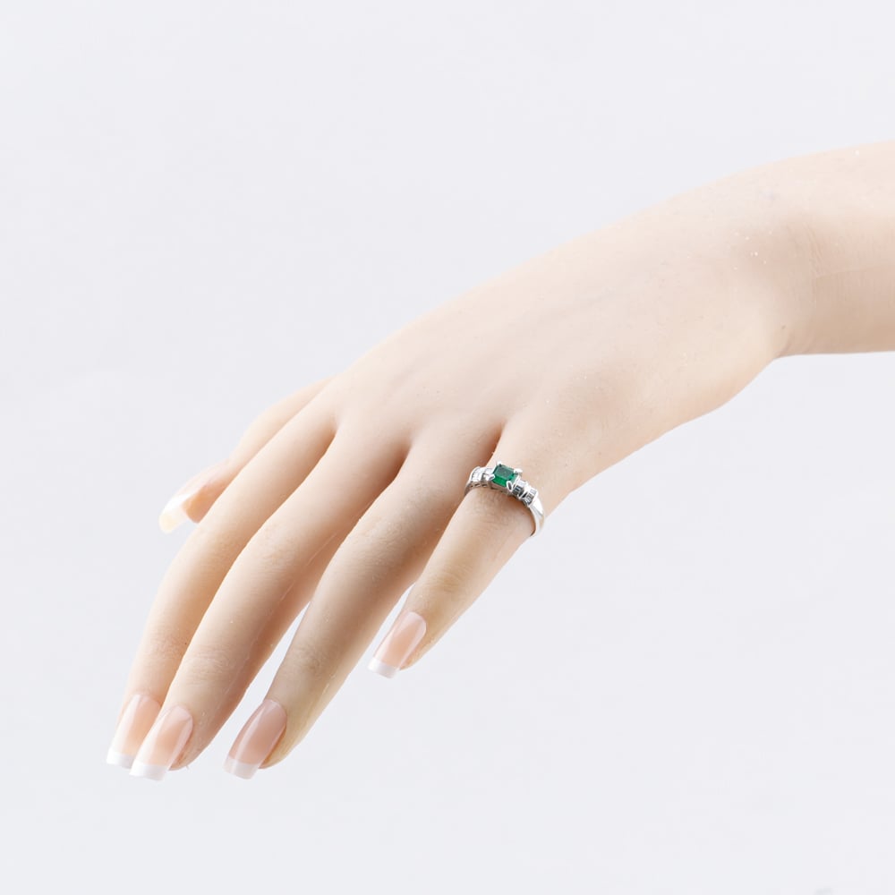 Pre-Owned Platinum 0.38ct Emerald & 0.23ct Baguette Cut Diamond Dress Ring 43371071