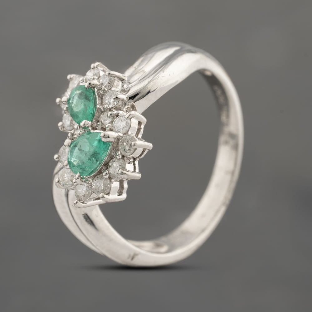 Click to view product details and reviews for Pre Owned Platinum 038ct Emerald And 032ct Brilliant Cut Diamond Pear Shape Double Cluster Ring 43371072.