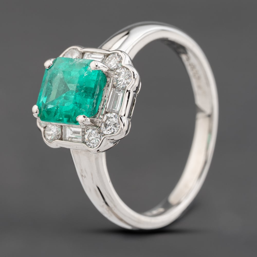 Click to view product details and reviews for Pre Owned Platinum 152ct Emerald And 054ct Diamond Cluster Ring 43371080.