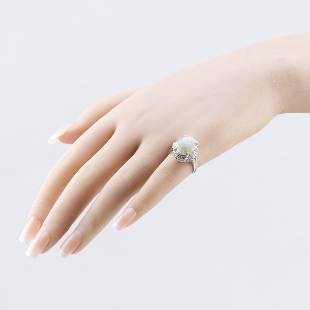 Pre-Owned Platinum 2.96ct Opal & 0.52ct Diamond Oval Cluster Ring 43381020