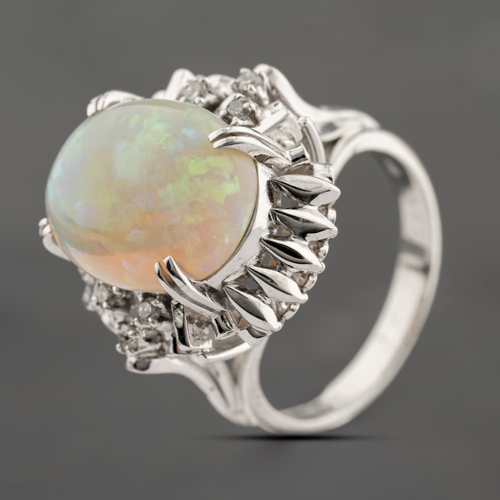 Click to view product details and reviews for Pre Owned Platinum 550ct Opal And 010ct Brilliant Cut Diamond Oval Cluster Ring 43381021. Click to view product details and reviews for Pre Owned Platinum 550ct Opal And 010ct Brilliant Cut Diamond Oval Cluster Ring 43381021.
