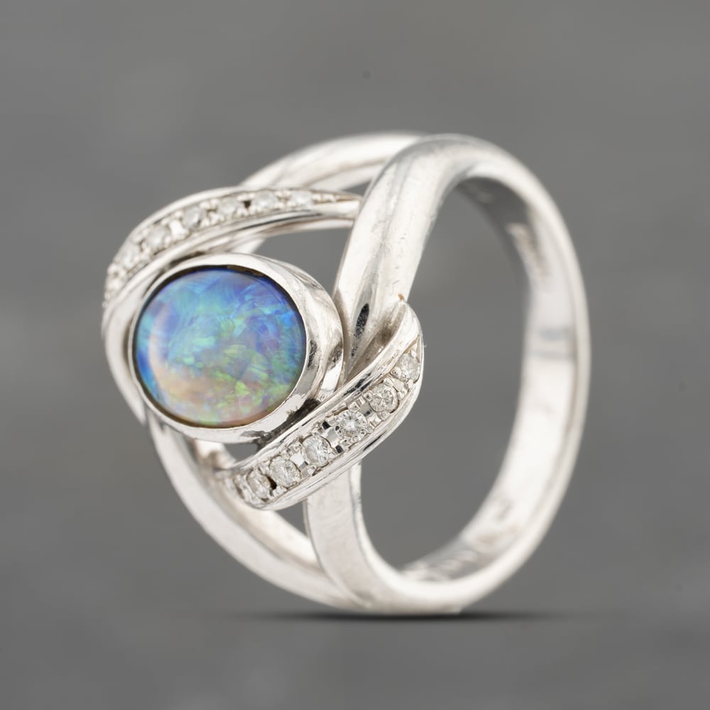 Click to view product details and reviews for Pre Owned Platinum 160ct Opal And 018ct Diamond Fancy Dress Ring 43381026.