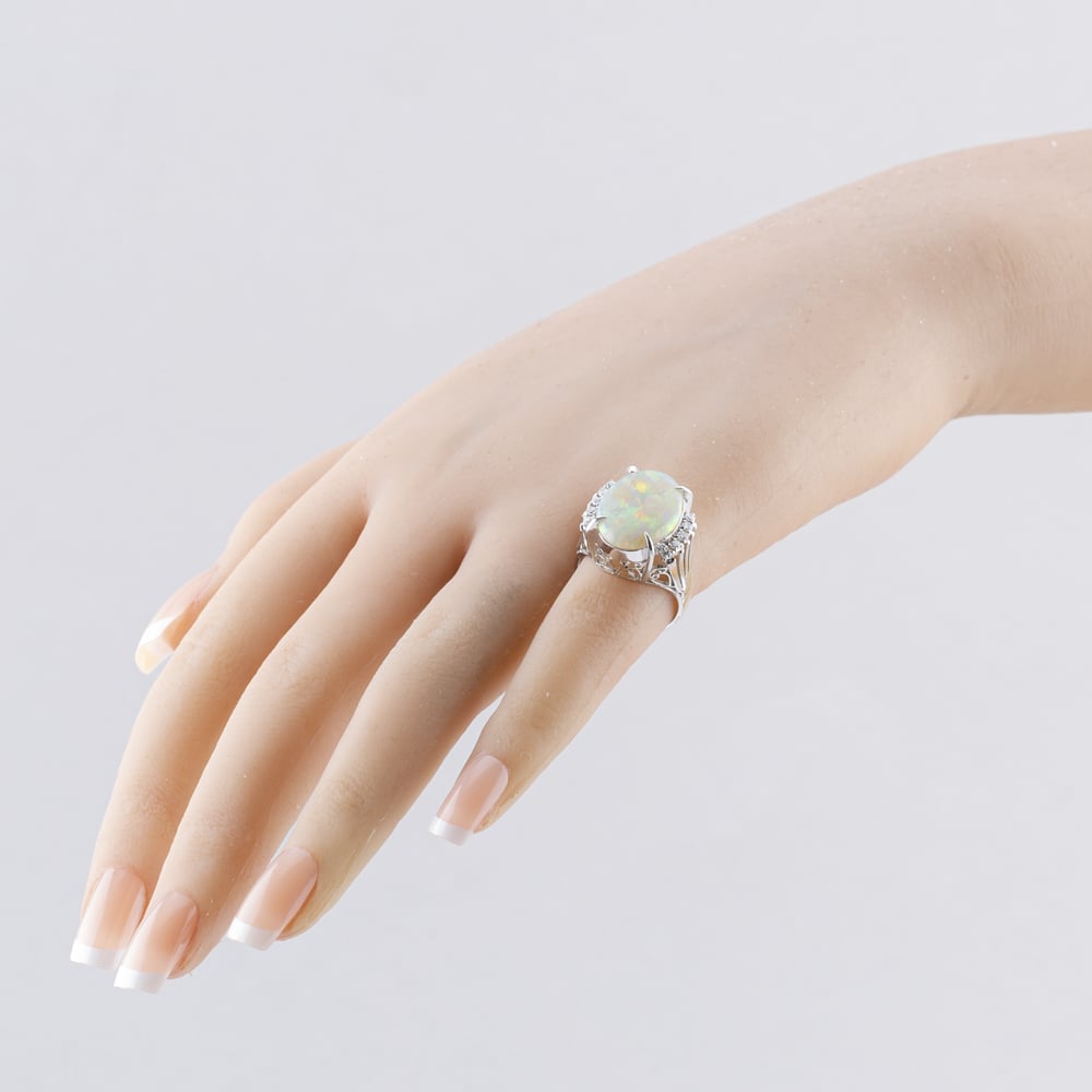 Pre-Owned Platinum 5.15ct Opal & 0.23ct Diamond Oval Dress Ring 43381032