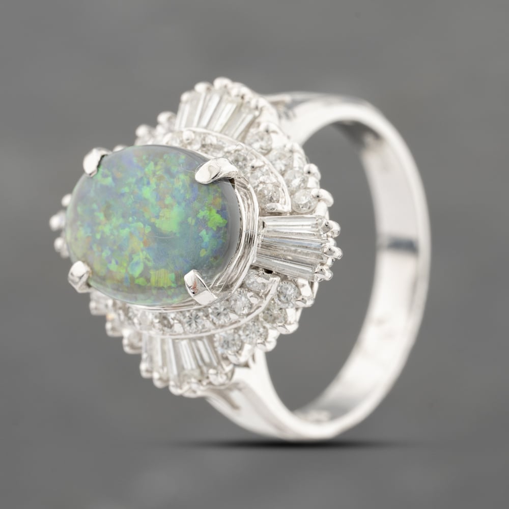 Click to view product details and reviews for Pre Owned Platinum 137ct Opal And 083ct Diamond Oval Cluster Ring 43381033.