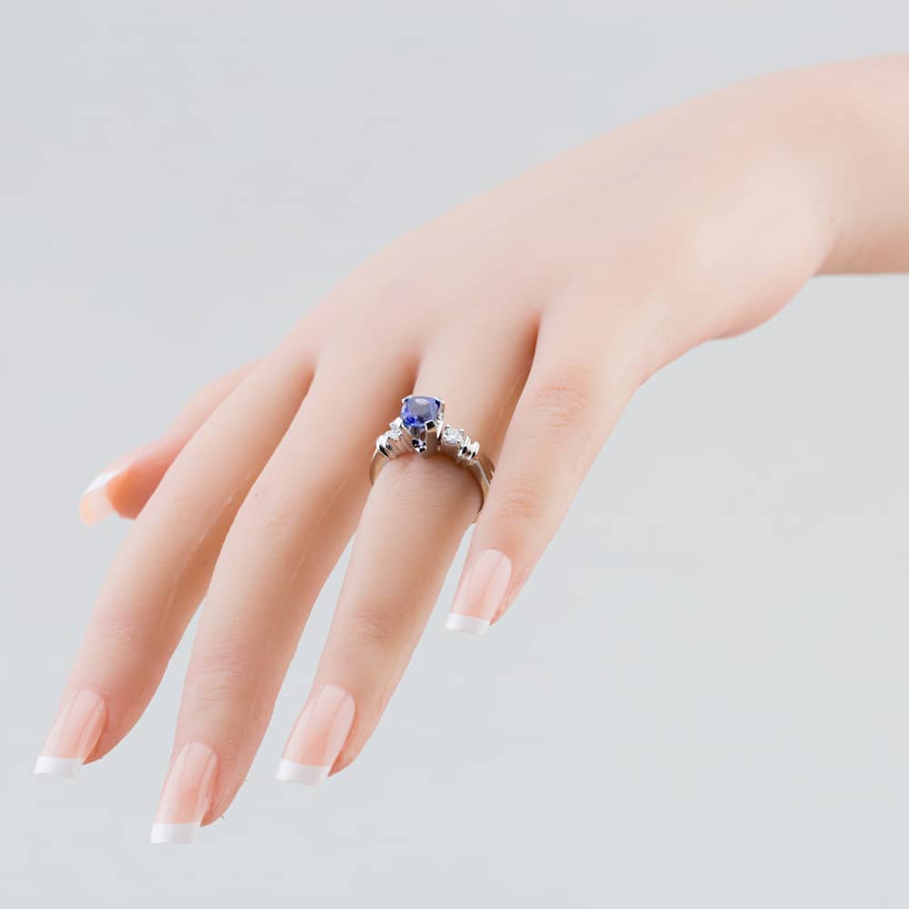 Pre-Owned 18ct White Gold 1.14ct Cushion Cut Tanzanite & 0.20ct Brilliant Cut Diamond Three Stone Ring 43411014