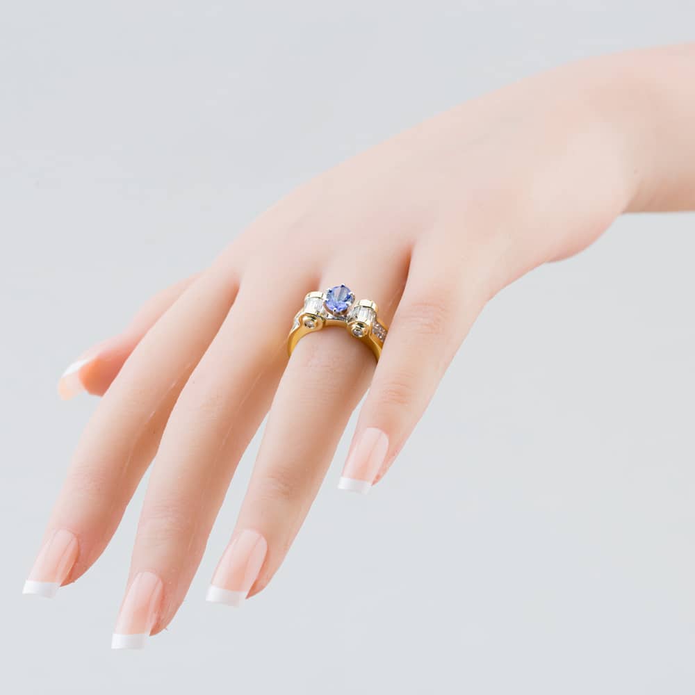 Pre-Owned 14ct Yellow Gold 0.88ct Oval Cut Tanzanite & Diamond Set Shoulders Dress Ring 43411018