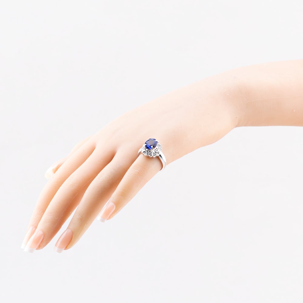 Pre-Owned Platinum 2.91ct Tanzanite & 0.22ct Brilliant Cut Diamond Oval Cluster Ring 43411032