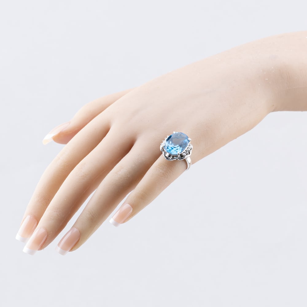 Pre-Owned Platinum 12.43ct Blue Topaz & 0.21ct Brilliant Cut Diamond Oval Dress Ring 43451016
