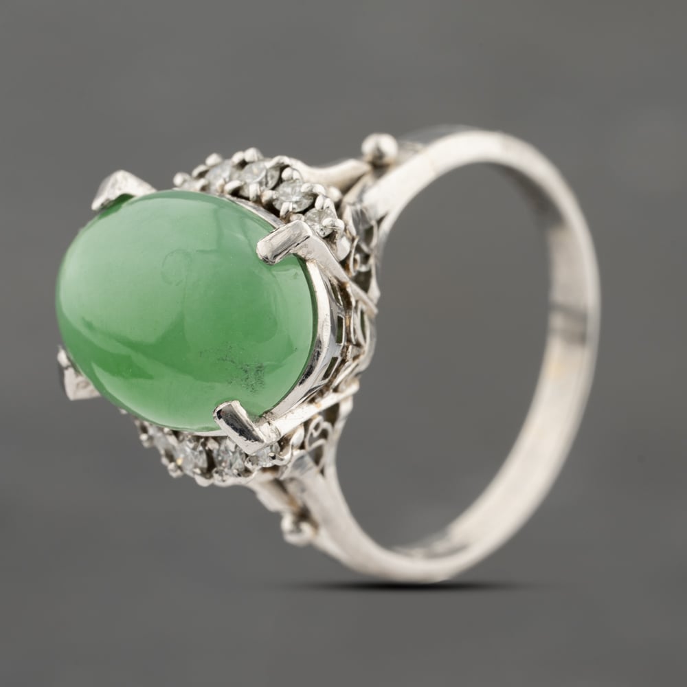 Click to view product details and reviews for Pre Owned Platinum Jade And 024ct Diamond Oval Dress Ring 43481000.