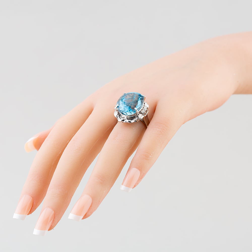 Pre-Owned Platinum Certificated 26.04ct Blue Topaz & 0.24ct Brilliant Cut Diamond Oval Dress Ring 43481008