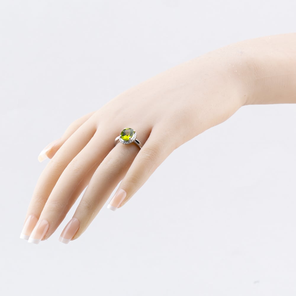 Pre-Owned Platinum 3.01ct Peridot & 0.28ct Diamond Oval Cluster Ring 43541005
