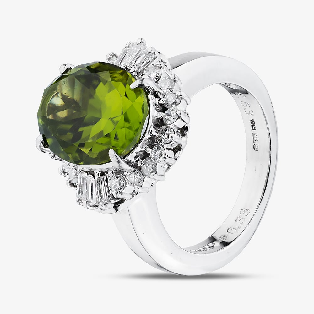 Click to view product details and reviews for Pre Owned Platinum 633ct Peridot And 063ct Diamond Oval Cluster Ring 43541006.
