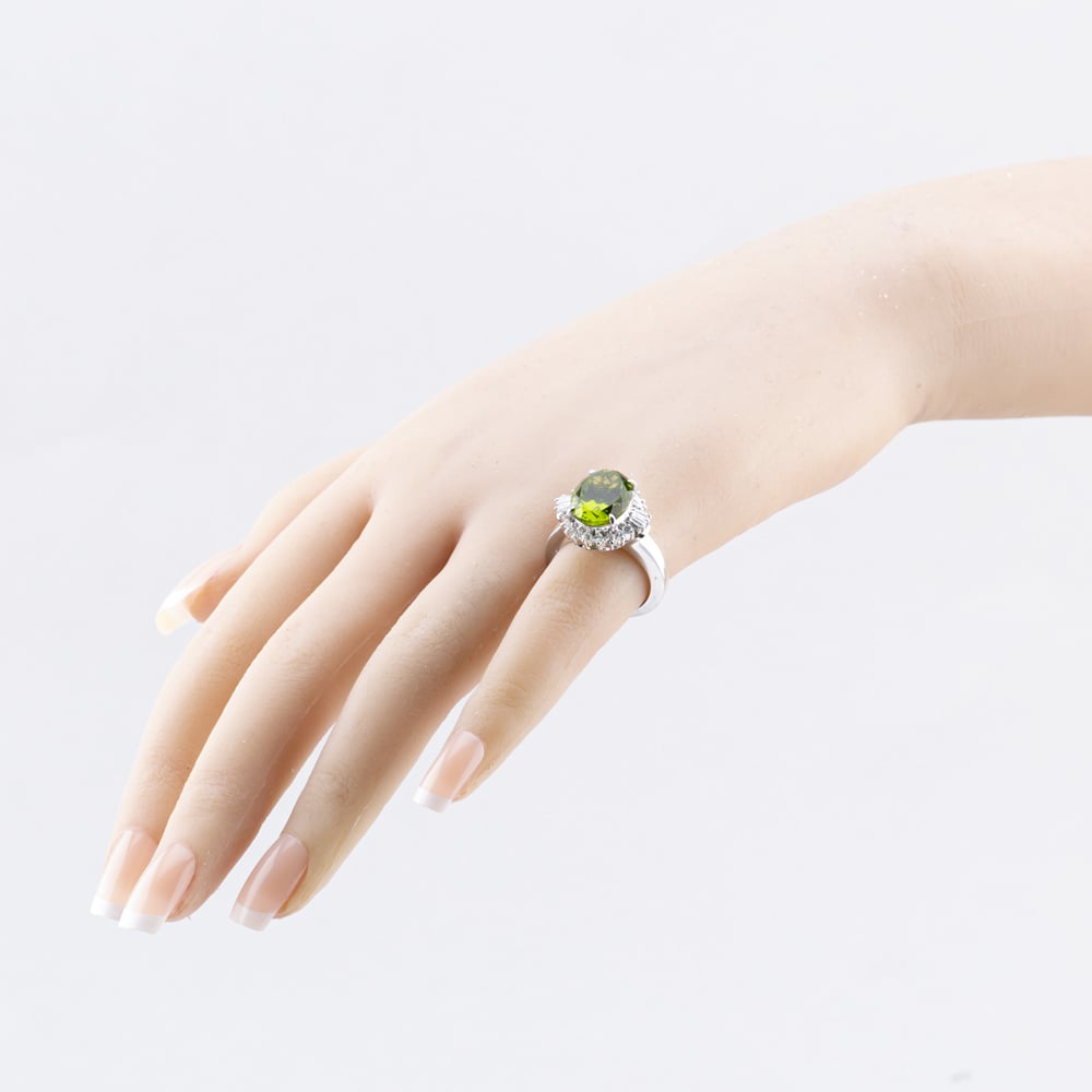 Pre-Owned Platinum 6.33ct Peridot & 0.63ct Diamond Oval Cluster Ring 43541006