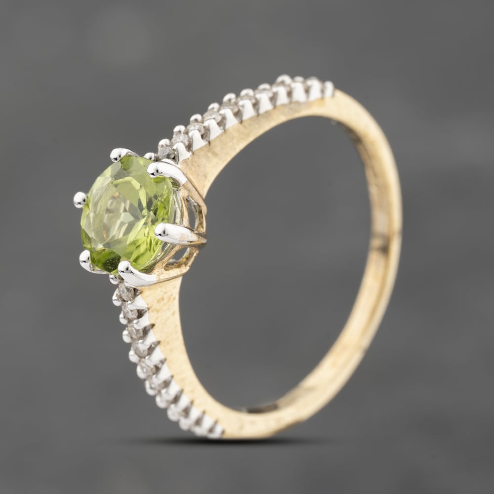 Click to view product details and reviews for Pre Owned 9ct Yellow Gold 100ct Peridot And 017ct Brilliant Cut Diamond Round Dress Ring 43541007.