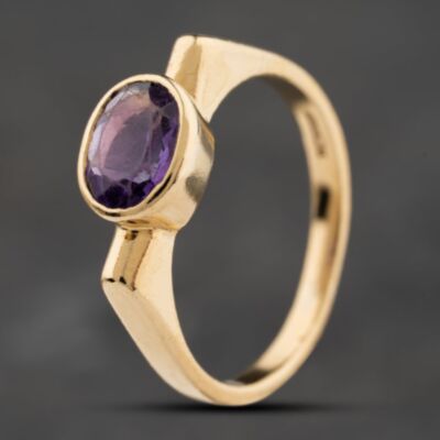 Pre-Owned 9ct Yellow Gold Amethyst Rubover Set Oval Dress Ring 41104229