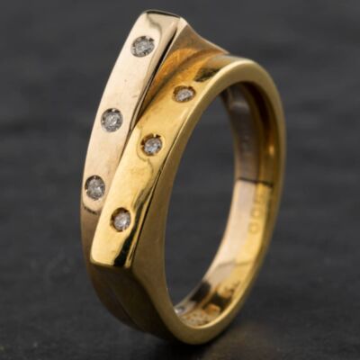 Pre-Owned 18ct Two Colour Gold 0.06ct Brilliant Cut Diamond Crossover Ring 4112050