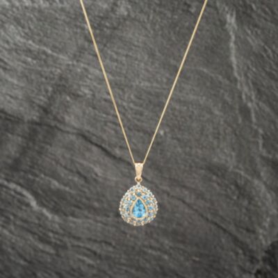 Pre-Owned 9ct Yellow Gold Blue Topaz Pearshaped Pendant & 18 Inch Curb Chain 41142991