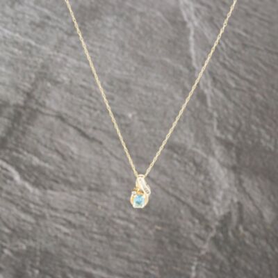 Pre-Owned 9ct Two Colour Gold Blue Topaz & 0.03ct Diamond Pendant & 18 Inch Prince Of Wales Chain 41143006