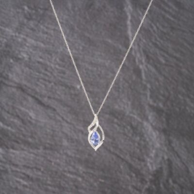 Pre-Owned White Gold 0.74ct Tanzanite & 0.05ct Diamond Pear Shaped Ribbon Pendant & 18 Inch Prince Of Wales Chain 41143160