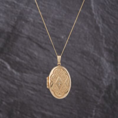 Pre-Owned 9ct Yellow Gold 0.01ct Brilliant Cut Diamond Engraved Oval Locket Pendant & 18 Inch Curb Chain 41143255
