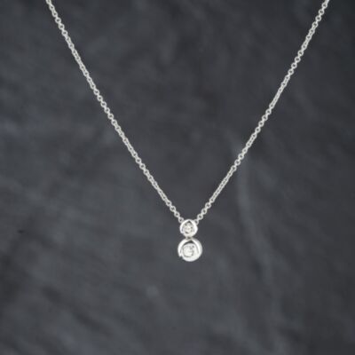 Pre-Owned 18ct White Gold 0.08ct Brilliant Cut Diamond Two Stone Pendant & 16 Inch Trace Chain 41143448