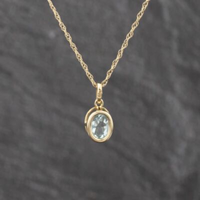 Pre-Owned Yellow Gold Blue Topaz Oval Pendant & 18 Inch Prince Of Wales Chain 41143627