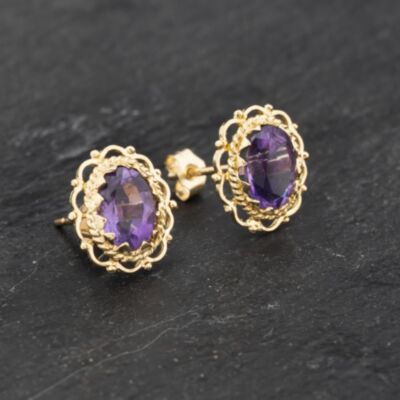 Pre-Owned Yellow Gold 10mm Amethyst Oval Stud Earrings 41173299
