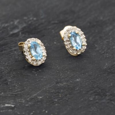 Pre-Owned Yellow Gold Blue Topaz & Diamond Oval 7.8mm Stud Earrings 41173300