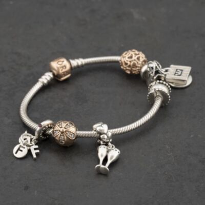 Pre-Owned Pandora Silver Pandora 7 Assorted Charms And 6.5 Inch Charm Bracelet 41221425