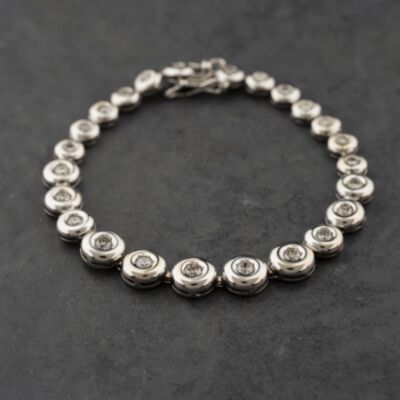 Pre-Owned 18ct White Gold 1.64ct Diamond Graduated Rubover Set 7 Inch Tennis Bracelet 41281858