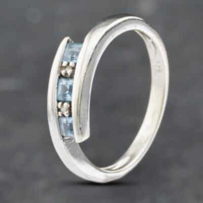 Pre-Owned 9ct White Gold Blue Topaz & Diamond Crossover Ring 41382637