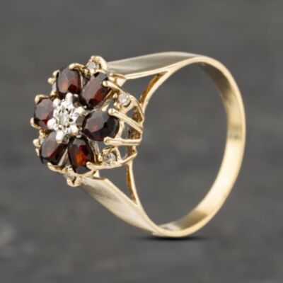 Pre-Owned 9ct Yellow Gold Garnet & 0.10ct Diamond Cluster Ring 41382960