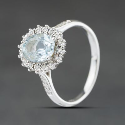 Pre-Owned 9ct White Gold Blue Topaz & 0.08ct Diamond Cluster Ring 41384389
