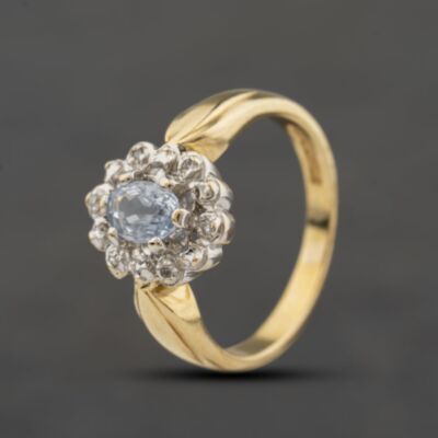 Pre-Owned 9ct Yellow Gold Blue Topaz & 0.04ct Diamond Oval Cluster Ring 41384515