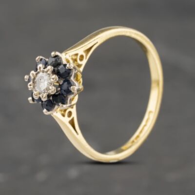 Pre-Owned 18ct Yellow Gold Sapphire & 0.12ct Brilliant Cut Diamond Round Cluster Ring 41482068