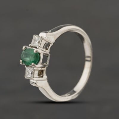 Pre-Owned 18ct White Gold Emerald & 0.20ct Princess Cut Diamond Oval Three Stone Ring 41482245