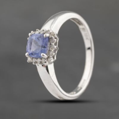 Pre-Owned 18ct White Gold 0.60ct Tanzanite & 0.07ct Diamond Halo Cluster Ring 41482297