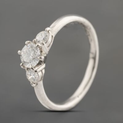 Pre-Owned Platinum 0.64ct Brilliant Cut Diamond Three Stone Ring 43121282