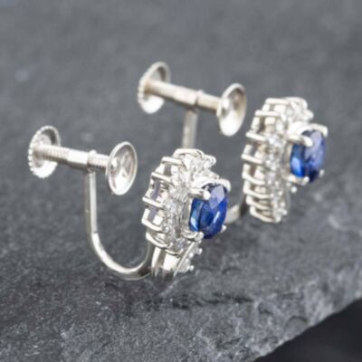 Pre-Owned Platinum 0.90ct Oval Cut Sapphire & 0.22ct Brilliant Cut Diamond Stud Earrings 43171038