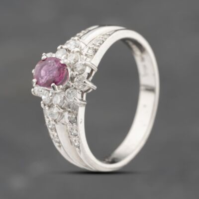 Pre-Owned Platinum 0.43ct Ruby & 0.36ct Diamond Oval Cluster Ring 43351062
