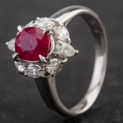 Pre-Owned Platinum Oval Ruby and Round and Pear Cut Diamond Cluster Ring 4335124