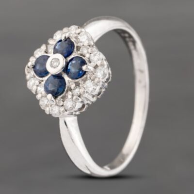 Pre-Owned Platinum Sapphire & 0.26ct Brilliant Cut Diamond Cluster Ring 43361149
