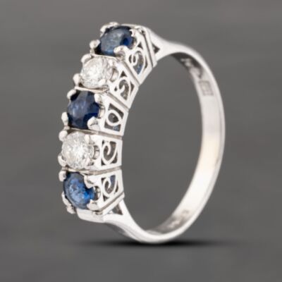 Pre-Owned Platinum 0.55ct Sapphire & 0.30ct Brilliant Cut Diamond Five Stone Ring 43361157