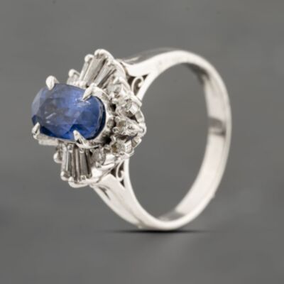 Pre-Owned Platinum 2.34ct Sapphire & 0.25ct Diamond Oval Cluster Ring 43361181