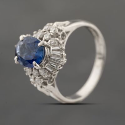 Pre-Owned Platinum Sapphire & 0.47ct Diamond Oval Cluster Ring 43361190