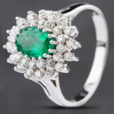 Pre-Owned 14ct White Gold 0.84ct Emerald & 0.53ct Brilliant Cut Diamond Oval Cluster Ring 4337018